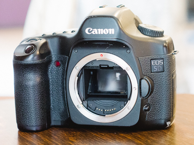The full frame Canon 5D can be had for under $700 on the used market and is the least expensive way to jump to full frame digital cameras.