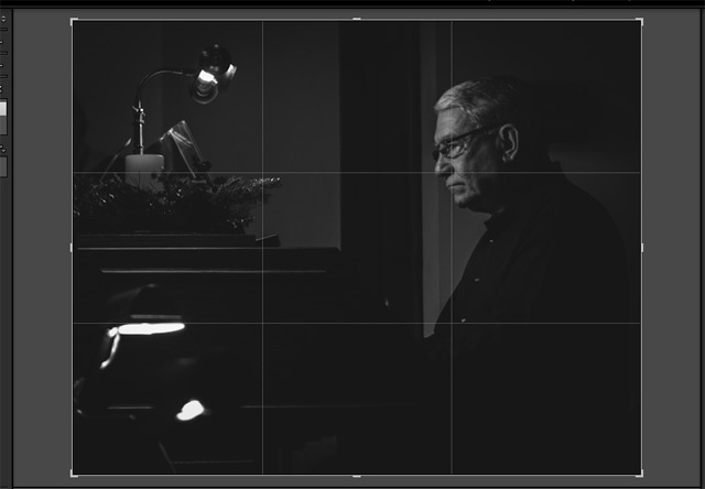 By default, opening the crop tool will overlay the rule of thirds grid. Classic photographic advice tells us that placing action at the intersection of these lines will render stronger compositions.